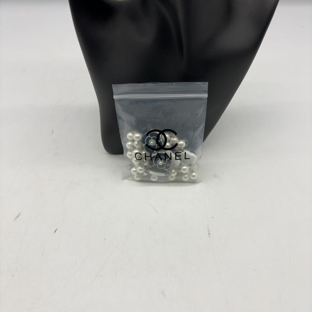CHANEL Black & White Camellia Pearl Triple-Strand Necklace